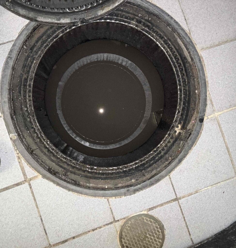 a close up of a grease trap