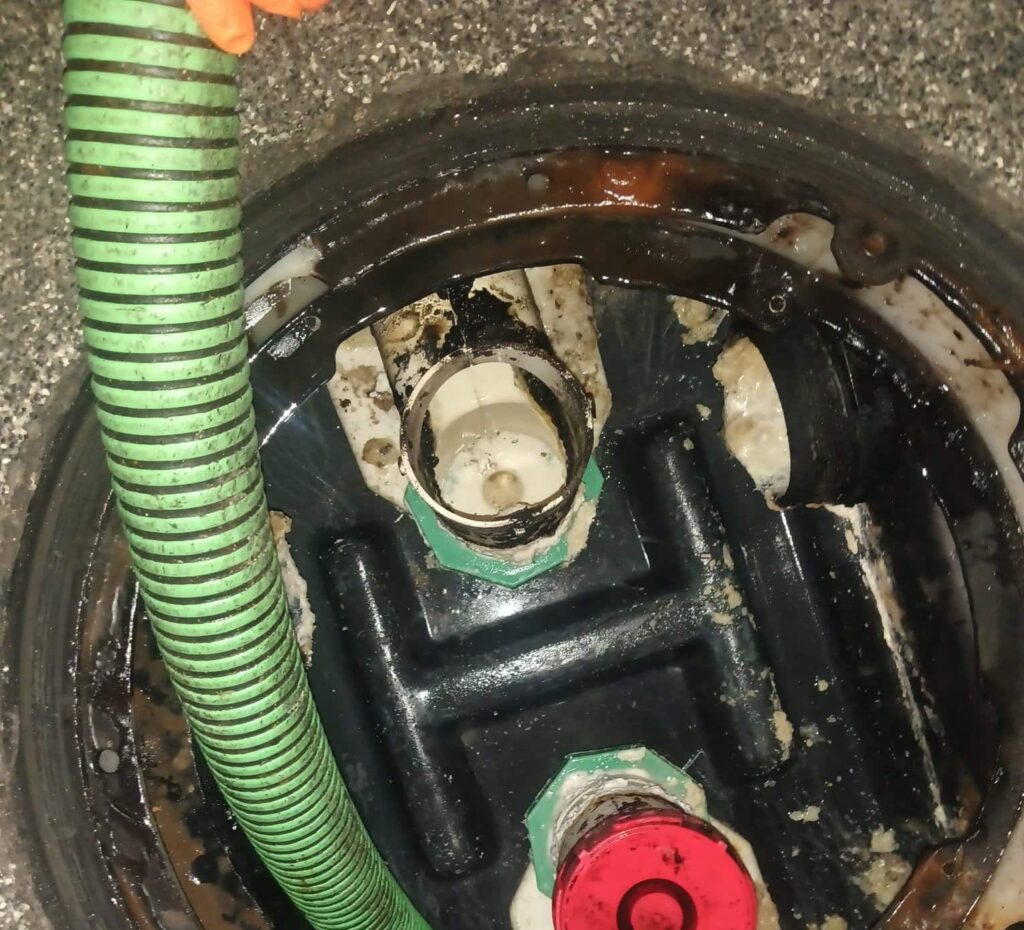 an after picture of a grease trap cleaning